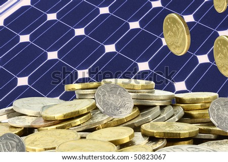 solar panel  and a heap of gold  coins