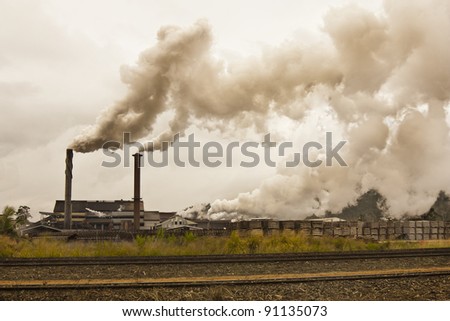 smog and pollution coming from a sugar mill