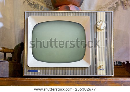 Old tv set in vintage interior