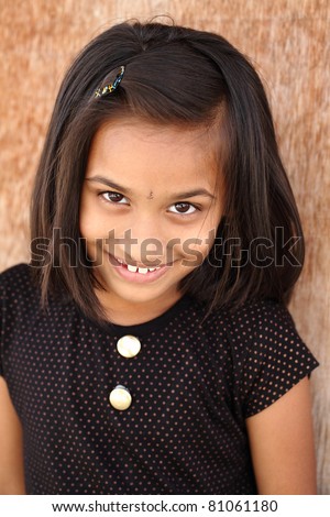 Indian girl looking at the camera / Indian girl / Indian girl