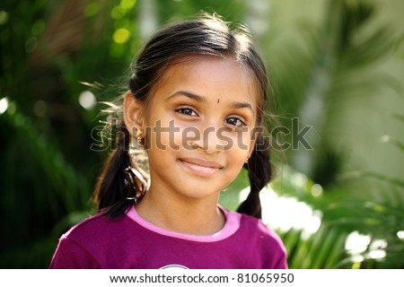 Beautiful Indian girl posing to the camera / Indian girl / Indian girl
