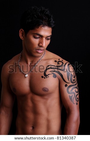 stock photo Indian young body builder posing to the camera