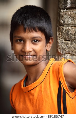 stock photo Indian teen boy posing to the camera
