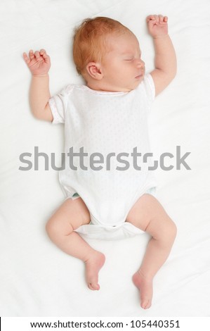 Sleeping Newborn Baby on White Bed Sheet