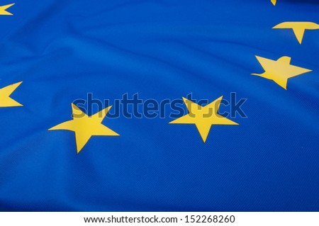 Closeup of Glossy Flag of European Union - EU Flag Drapery - Shallow Depth of Field