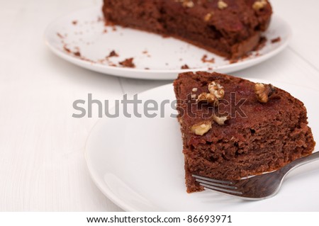 Homemade Gingerbread Cake With Jam and Walnuts on Plate
