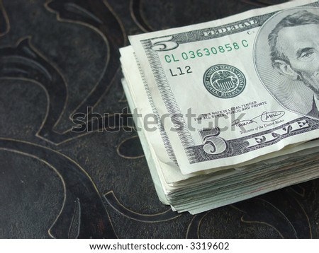 five dollar bills