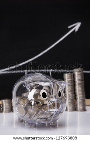 Savings in piggy bank! A lot of money! Isolated on white background!