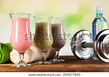 Healthy diet, protein shakes, fruits and sport and fitness concept
