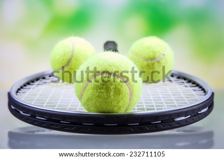 A set of tennis. Racket and ball. Studio shot