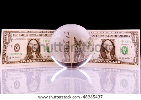 Glass globe / world and money around