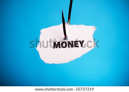 Money on piece of paper on hook