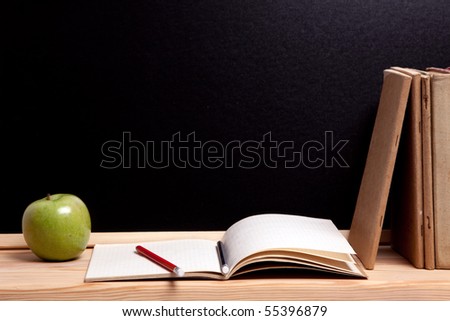 School concept, educational equipments, ruler, board and apple.