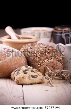 Bakery, baking bread and other tasty food, in natural way on wooden table!