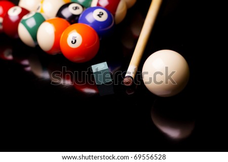 Billiard balls on black background