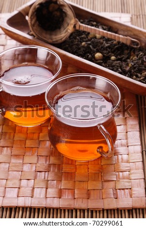 Tea time! Hod healthy natural tea on mat