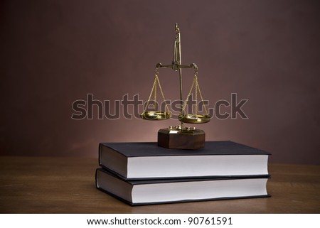 Gavel of justice and gavel on desk with dark background