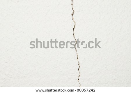The detail of broken white plaster board