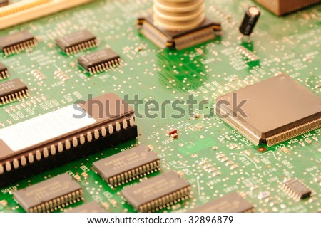 A circuit board with microchips, resistors and other semiconductor devices