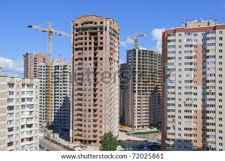 Residential houses under construction in a new city district