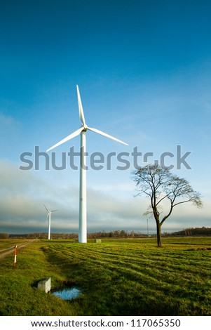 Two wind electric generators in field
