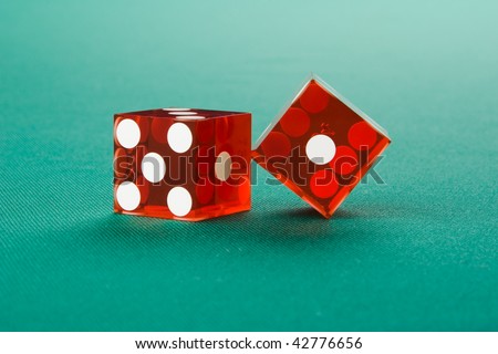 original vegas dice on blue casino table