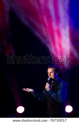 LJUBLJANA, SI - MAY 24: Slovenian singer Saso Vrabic performing during concert of jazz vocal group Perpetuum Jazzile in Open Air Theatre on May 24, 2011 in Ljubljana, Slovenia.