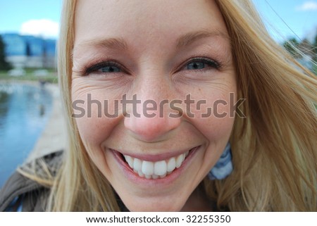 Close up of a beautiful woman with lots of smile lines