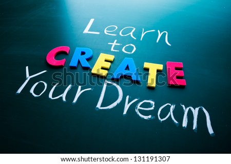 Learn to create your dream, color words on blackboard
