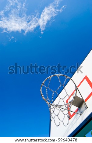 Basketball stands under blue sky  in sunny dy