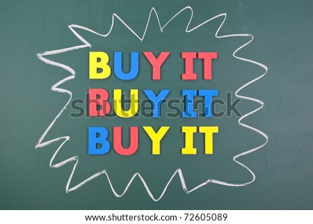 Buy it, colorful words on blackboard, marketing concept