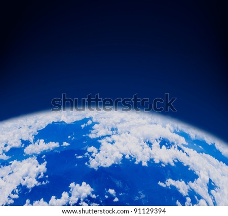 blue earth in space with mountains and clouds