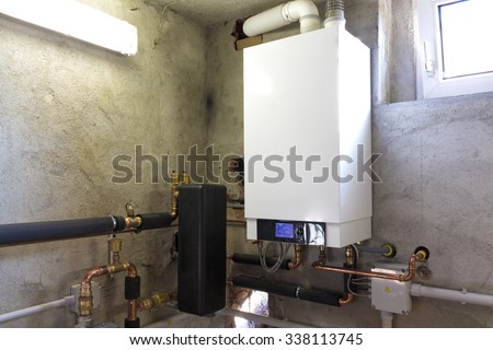 Condensing gas boiler in the boiler room