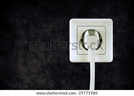 old socket with plugged cable in retro design look