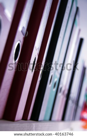 shelf in a office with many files