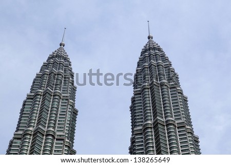 KUALA LUMPUR - APRIL 26: The Petronas Twin Towers are the world's tallest twin towers. The skyscraper height is 451.9m. April 26,2013, in Kuala Lumpur, Malaysia