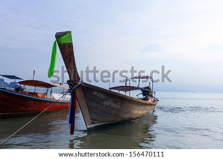 KRABI, THAILAND - JULY 7 : Unidentified tourists and longtail boat ride on the shuttle service tourists to the islands on July 7,2013 in Krabi ,Thailand.