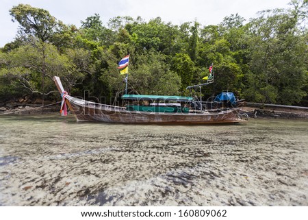 KRABI, THAILAND - JULY 7 : Traditional shuttle service longtail boat serves for the tourist  for sightseeing the islands on July 7,2013 in Krabi ,Thailand.