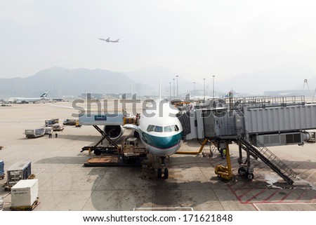 HONG KONG -NOV 7 : Cargoes being loaded to a Cathay aircraft at Hong Kong airport on November 7,2013 in Hong Kong. Aside from China Airlines, Cathay is one of the most busy carriers in the region.