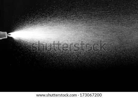 Close Up Of A Spray Drops On Black Background