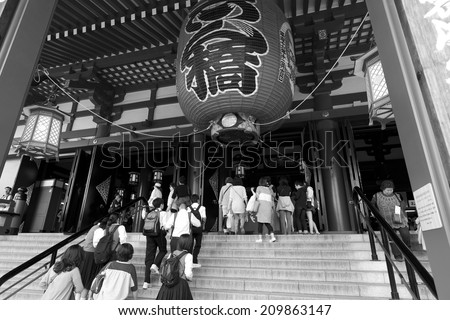 TOKYO,JAPAN - MAY 28 :Unidentified tourists in the Senso-ji Temple on May 28,2014 in Tokyo,Japan. The Senso-ji Buddhist Temple is the symbol of Asakusa and one of the most famed temples in Japan.