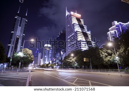 SHENZHEN, CHINA - JULY 14 : Hi-rise building in city center at night time on July 14,2014 in Shenzhen,China. Shenzhen is China\'s financial center and first\'s  special economic zone.