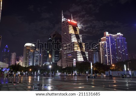 SHENZHEN, CHINA - JULY 14 : Hi-rise building in city center at night time on July 14,2014 in Shenzhen, China. Shenzhen is China\'s financial center and first\'s special economic zone.