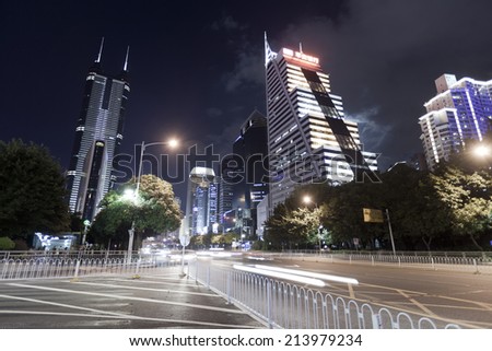 SHENZHEN, CHINA - JULY 14 : Hi-rise building in city center at night time on July 14,2014 in Shenzhen,China. Shenzhen is China's financial center and first's special economic zone.