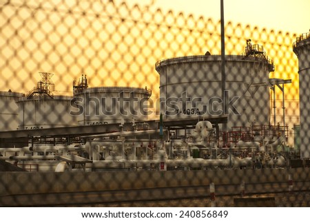 Wire fence of oil tank refinery