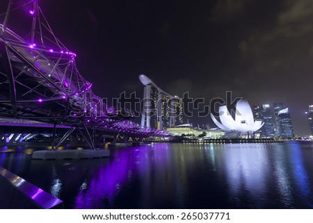 Singapore - MAR 20 : Nightscape of Singapore Marina Bay Sand on March 20,2015 in Singapore. Marina Bay Sands is billed as the world\'s most expensive standalone casino property at S$8 billion.