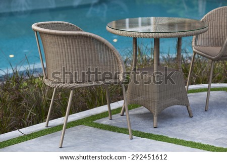 outdoor furniture rattan chairs and table on terrace