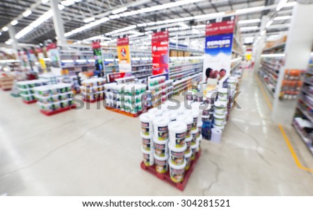 wide ankle view of home painting department at hardware store ,blur image.