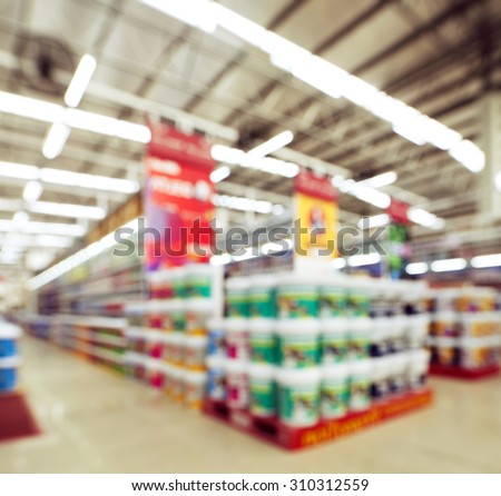 view of home painting department at hardware store ,blur image.
