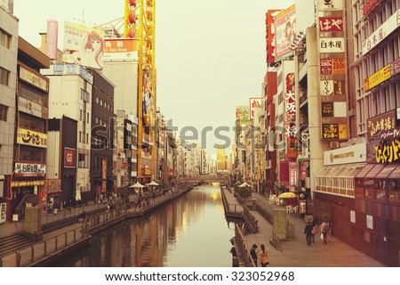 OSAKA,JAPAN - APRIL 20,2015 :Dotonbori canal is a popular nightlife and entertainment area characterized by its eccentric atmosphere and large illuminated signboards.
